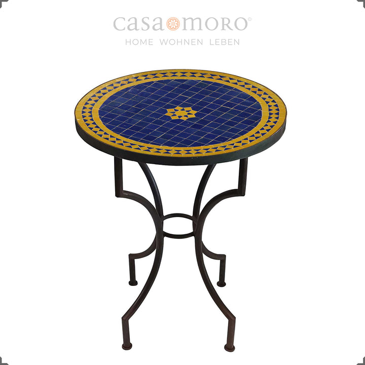 Mozaïektafel als eettafel voor twee met een stervormig zelligepatroon in blauw en geel