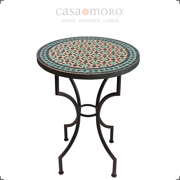 Ronde mozaïektafel met een zwart en turquoise patroon - ideaal voor op het terras of balkon