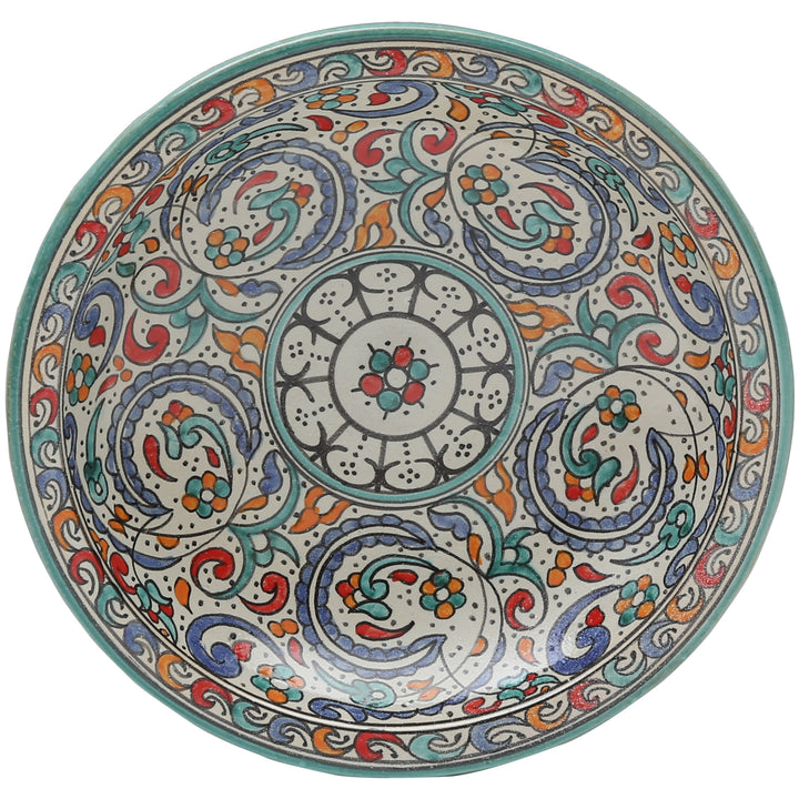 Handgeschilderde keramische schaal uit Fès met een kleurrijk ornament van bloemen en ranken