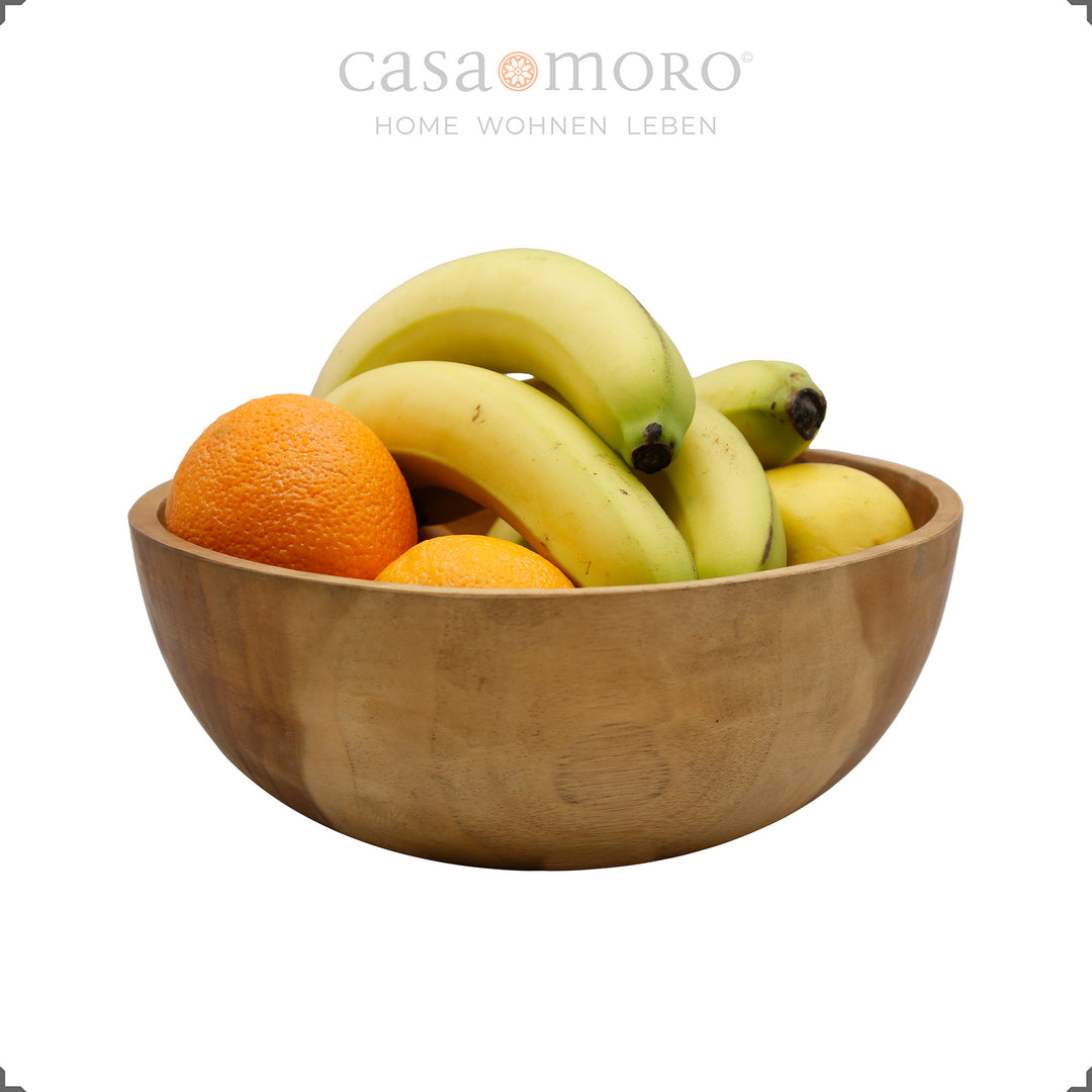 Fruitschaal van natuurlijk teakhout gevuld met fruit