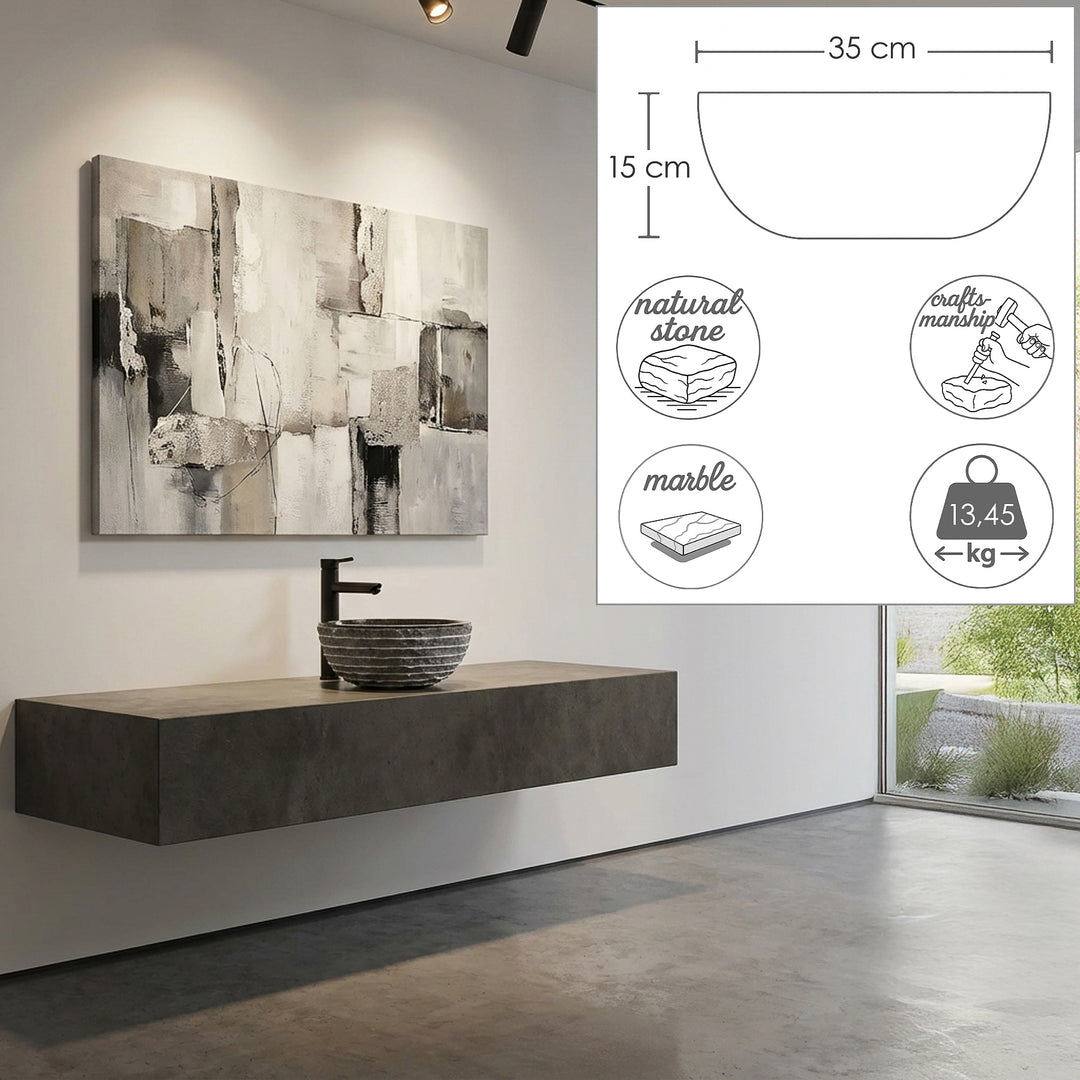 Lavabo à poser rond en marbre sur lavabo flottant dans une salle de bain moderne avec graphiques dimensionnels intégrés