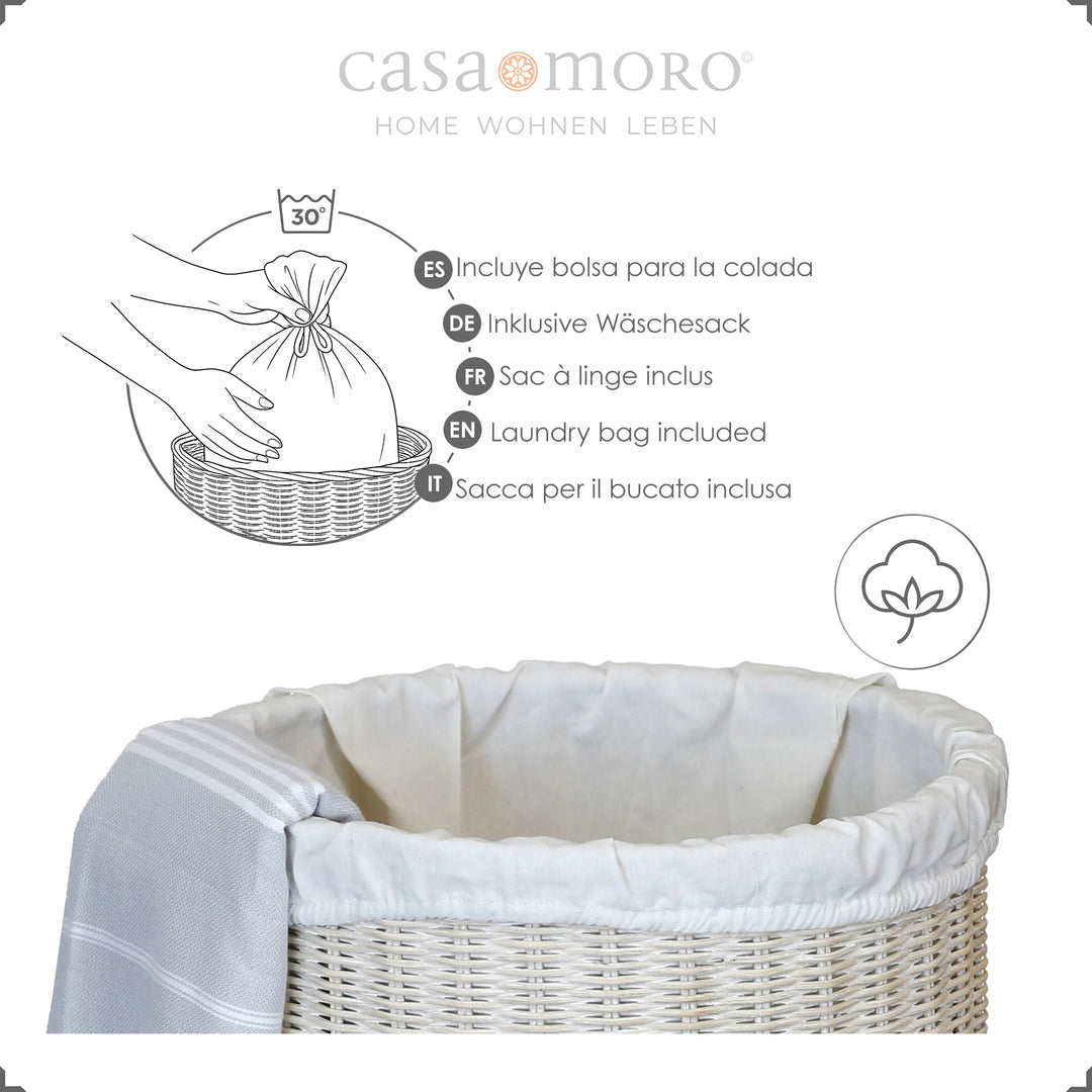 Panier à linge en rotin blanchi à la chaux avec insert en coton léger, décoré d'une serviette de hammam